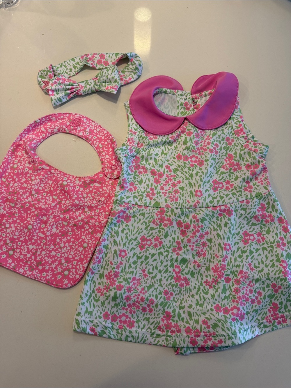Pink Floral Baby One-Piece with Matching Bib and Headband